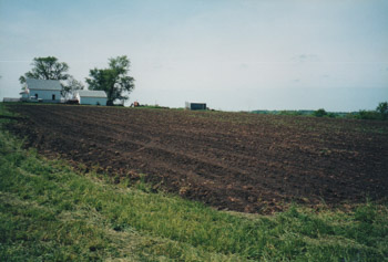 The plowed field is where the Carlson’s home was located when their parents first moved to Buxton from Hocking shortly after they were married in 1909
